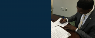 DEQ Secretary Michael Regan signs Consent Order on Feb. 25, 2019 DEQ Secretary Michael Regan signs Consent Order on Feb. 25, 2019