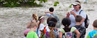 Lori Davis, Education Coordinator Students on a Coastal Reserve field trip