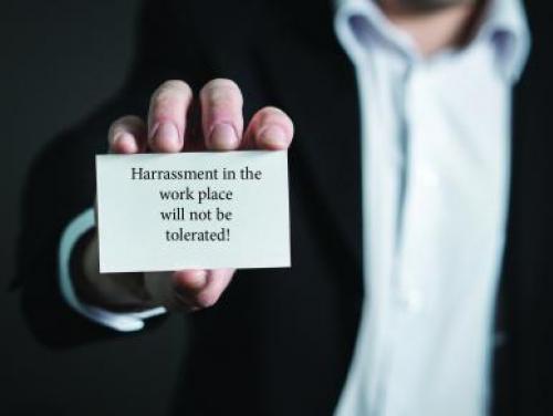 man holding business card