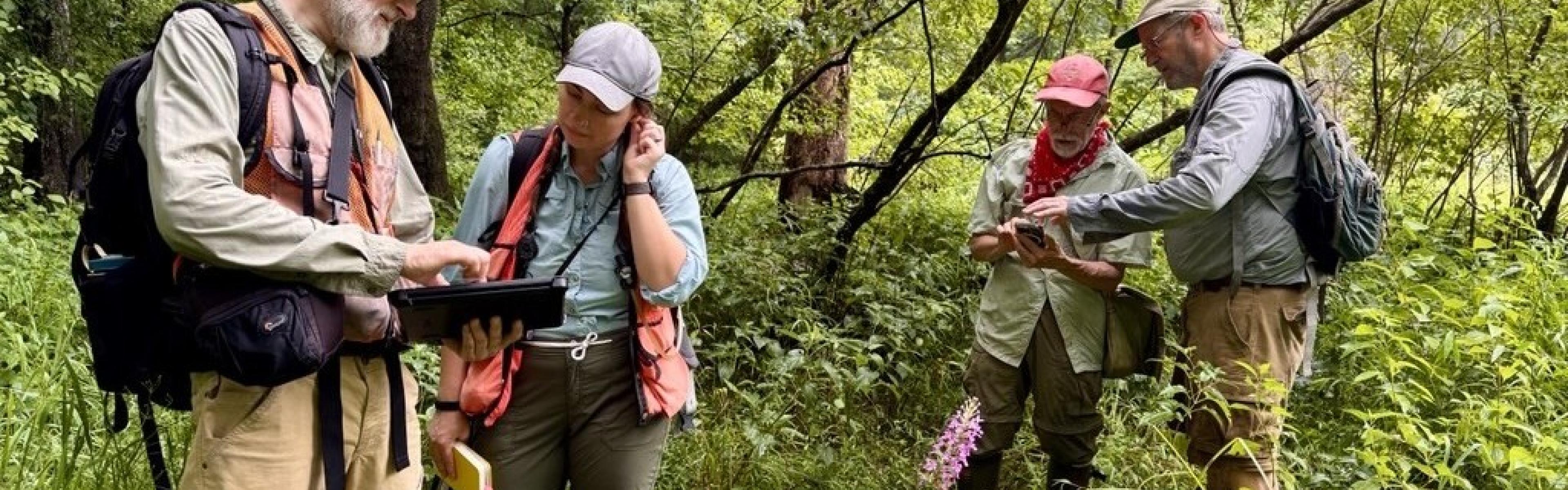 NHP biologists collecting data