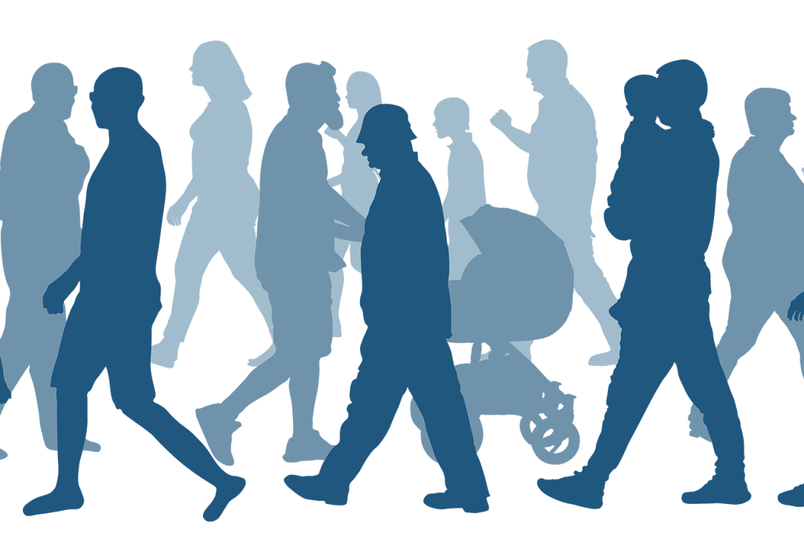 Sillohettes of people walking in different directions