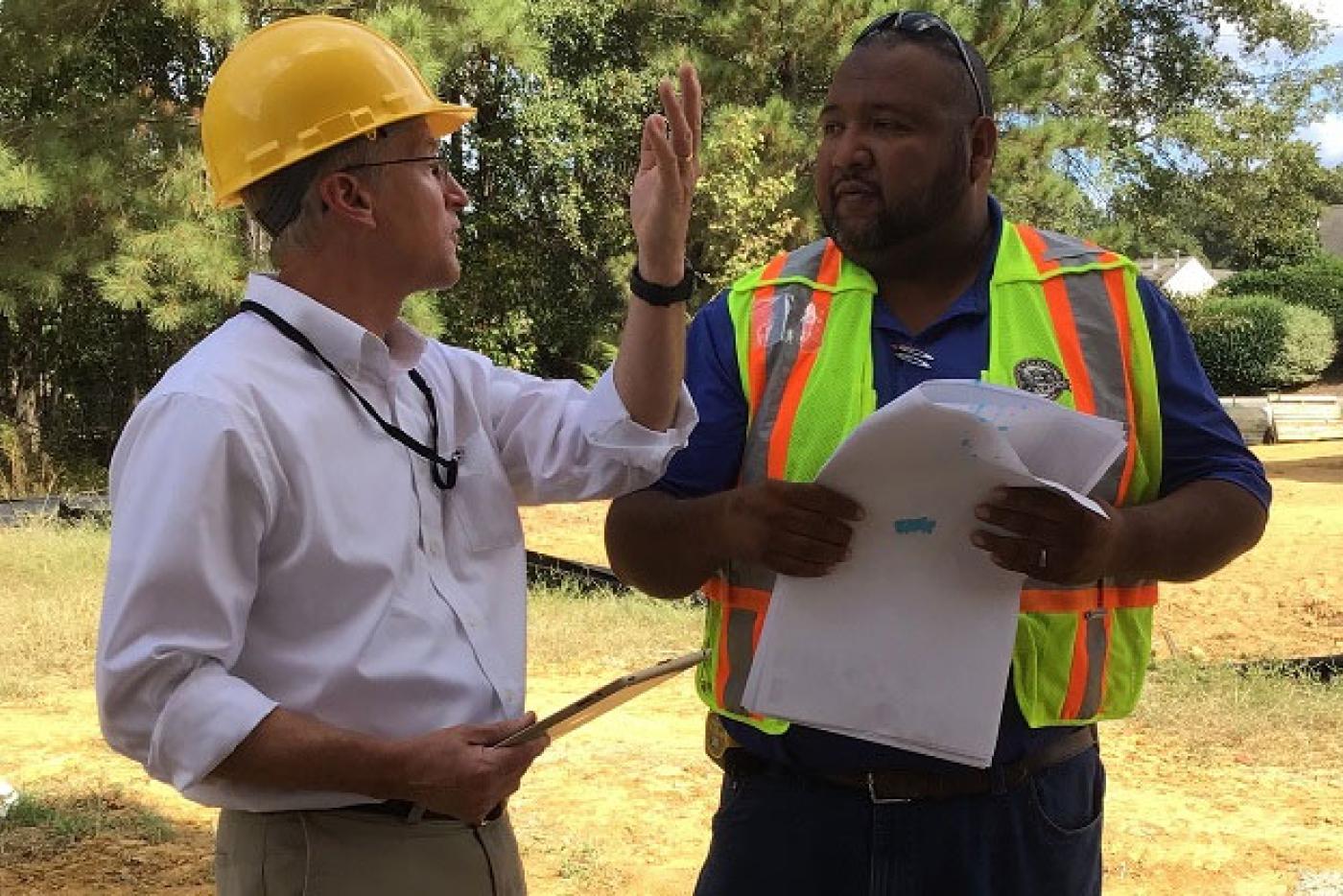 Code enforcement officials talking
