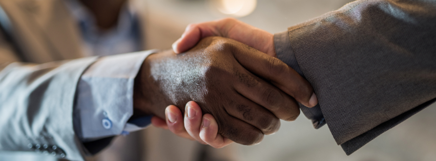 Closeup on a handshake.