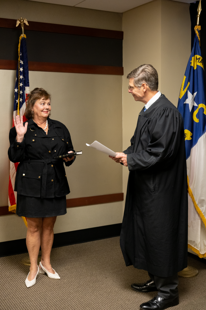 Commissioner being sworn in