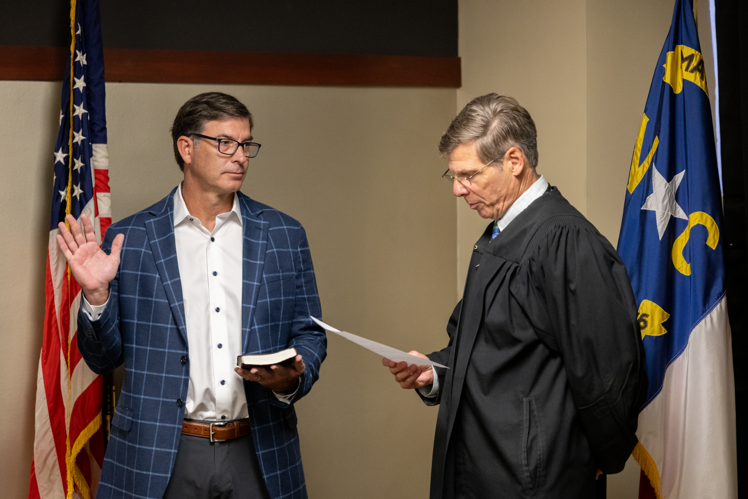 Commissioner being sworn in