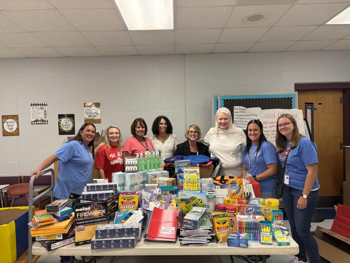 Director Meyer delivering school supplies.