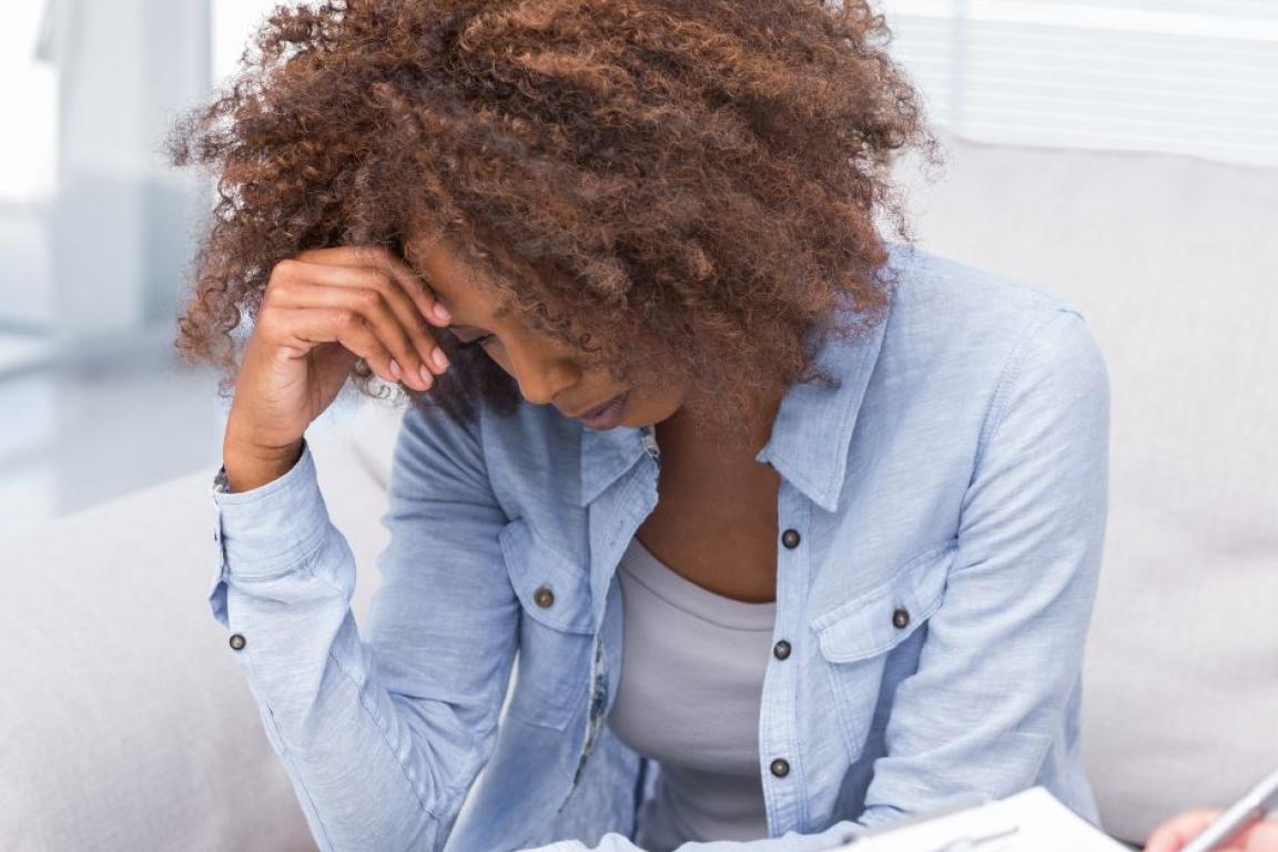 Woman looking pensive.