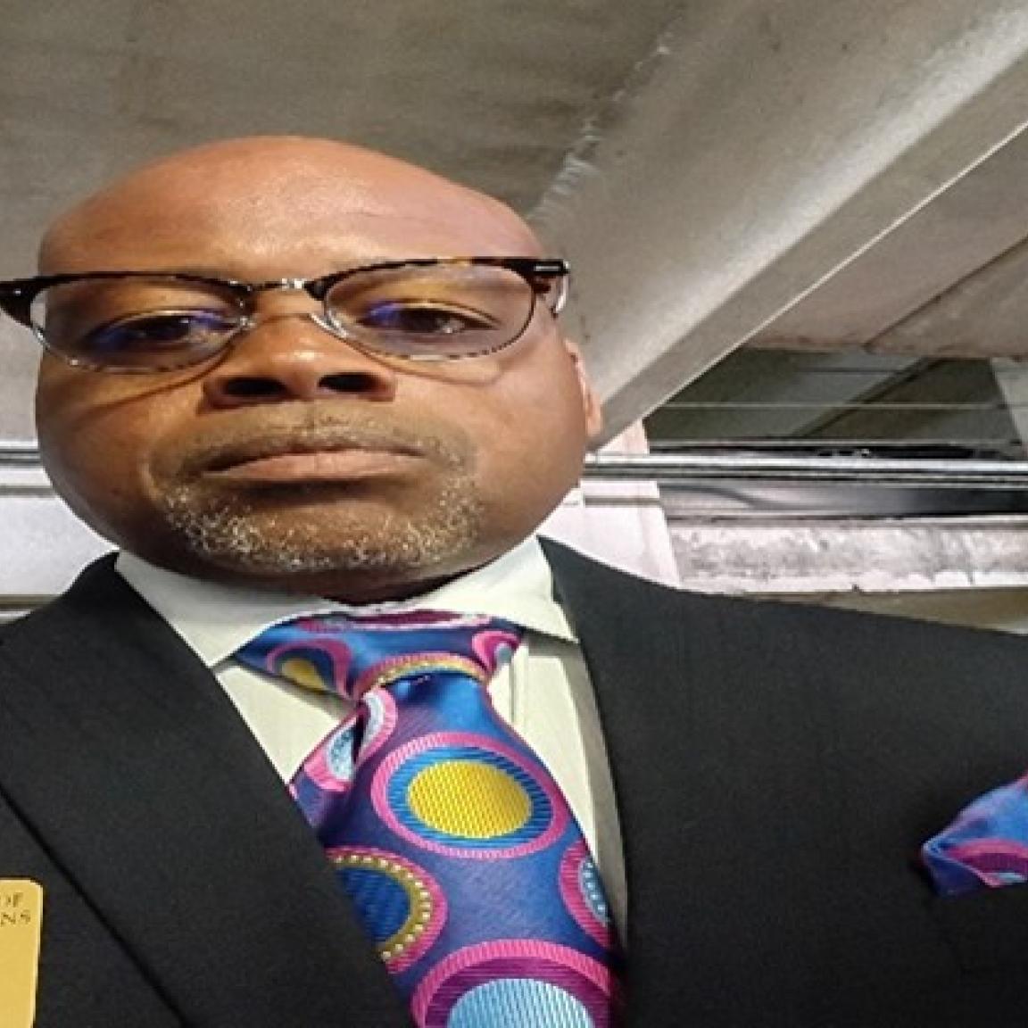 A man's profile picture.