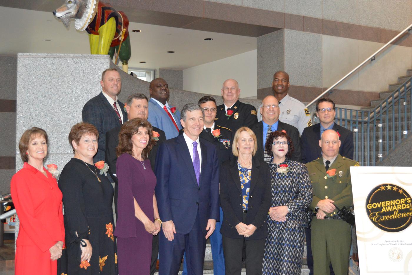 Governor Roy Cooper with Governor's Award recipients.