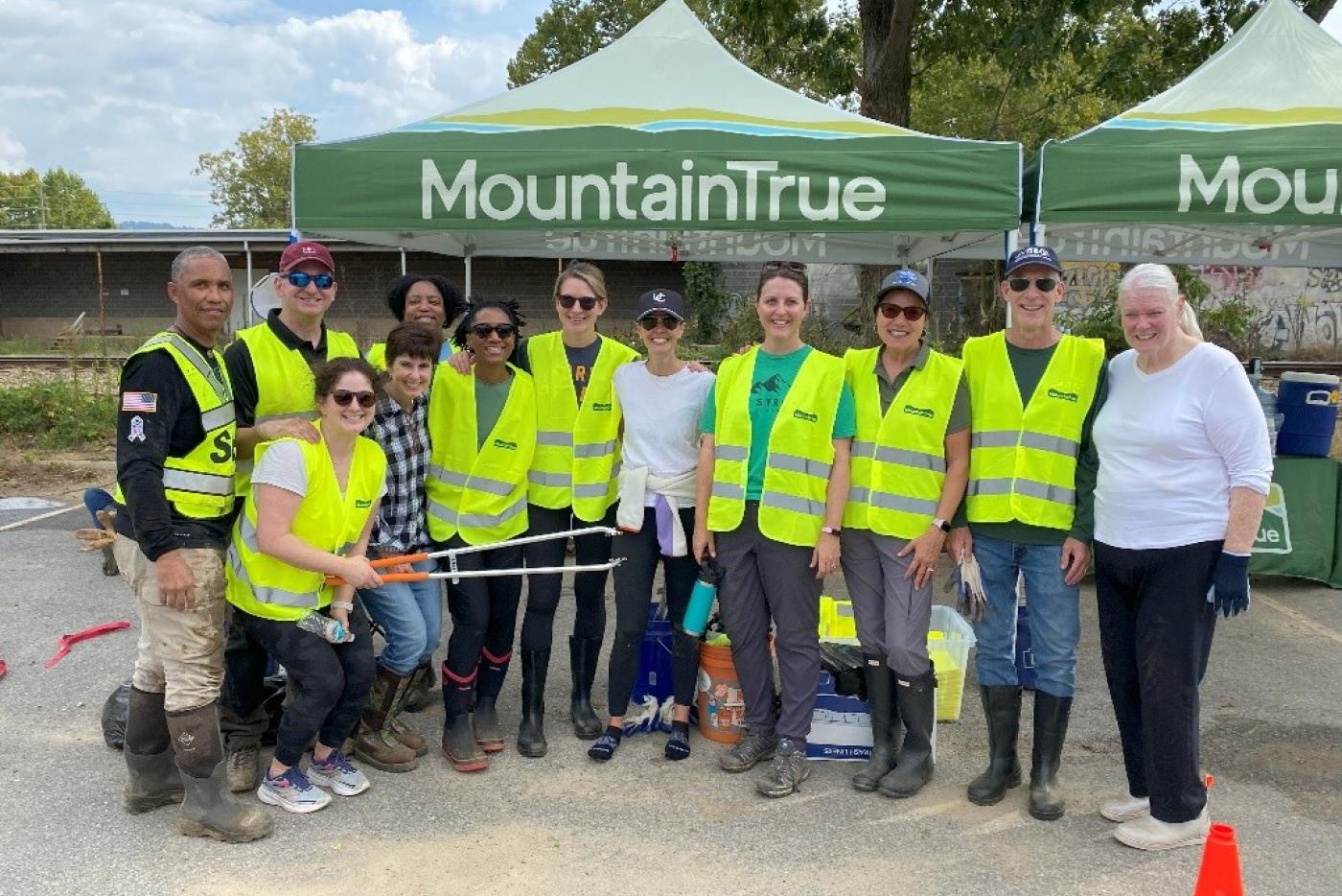Director Meyer, Governor Stein, and his cabinet performing community service.
