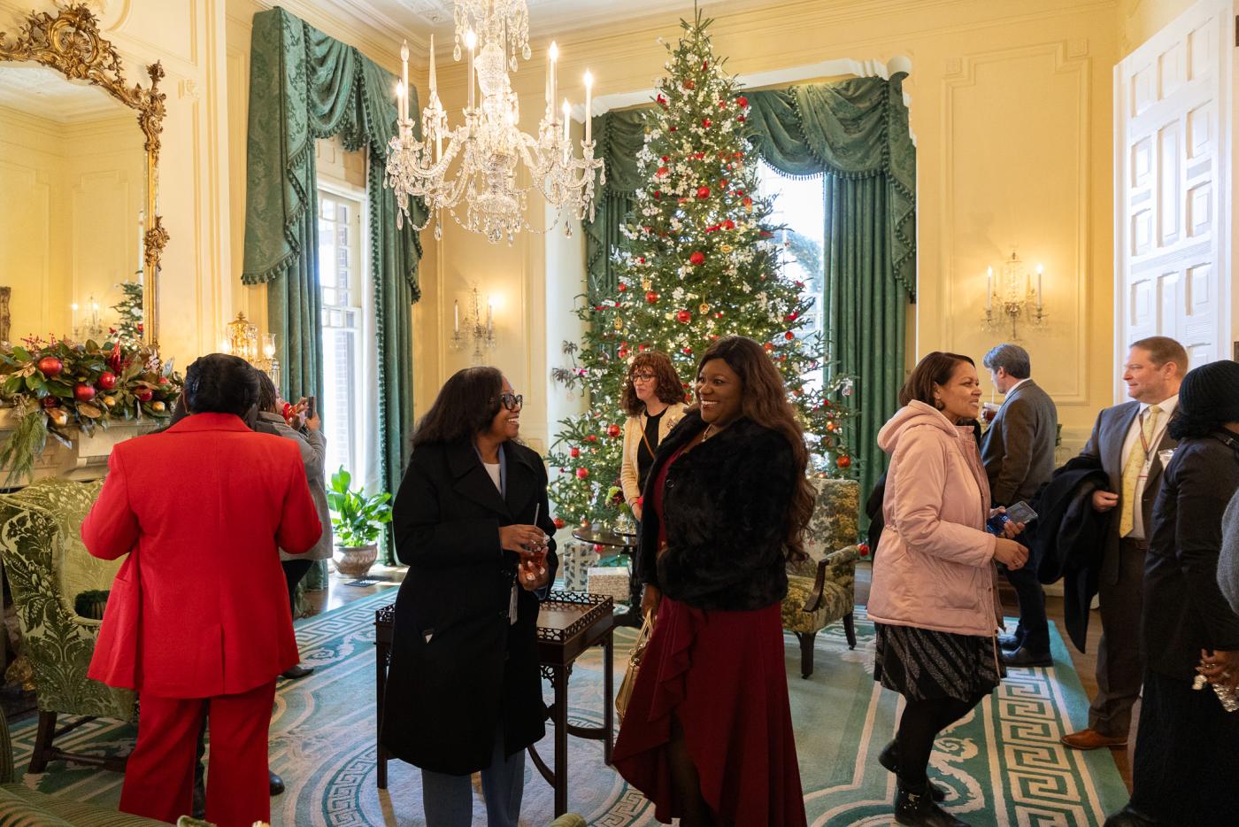 State employees gathered around a Christmas tree