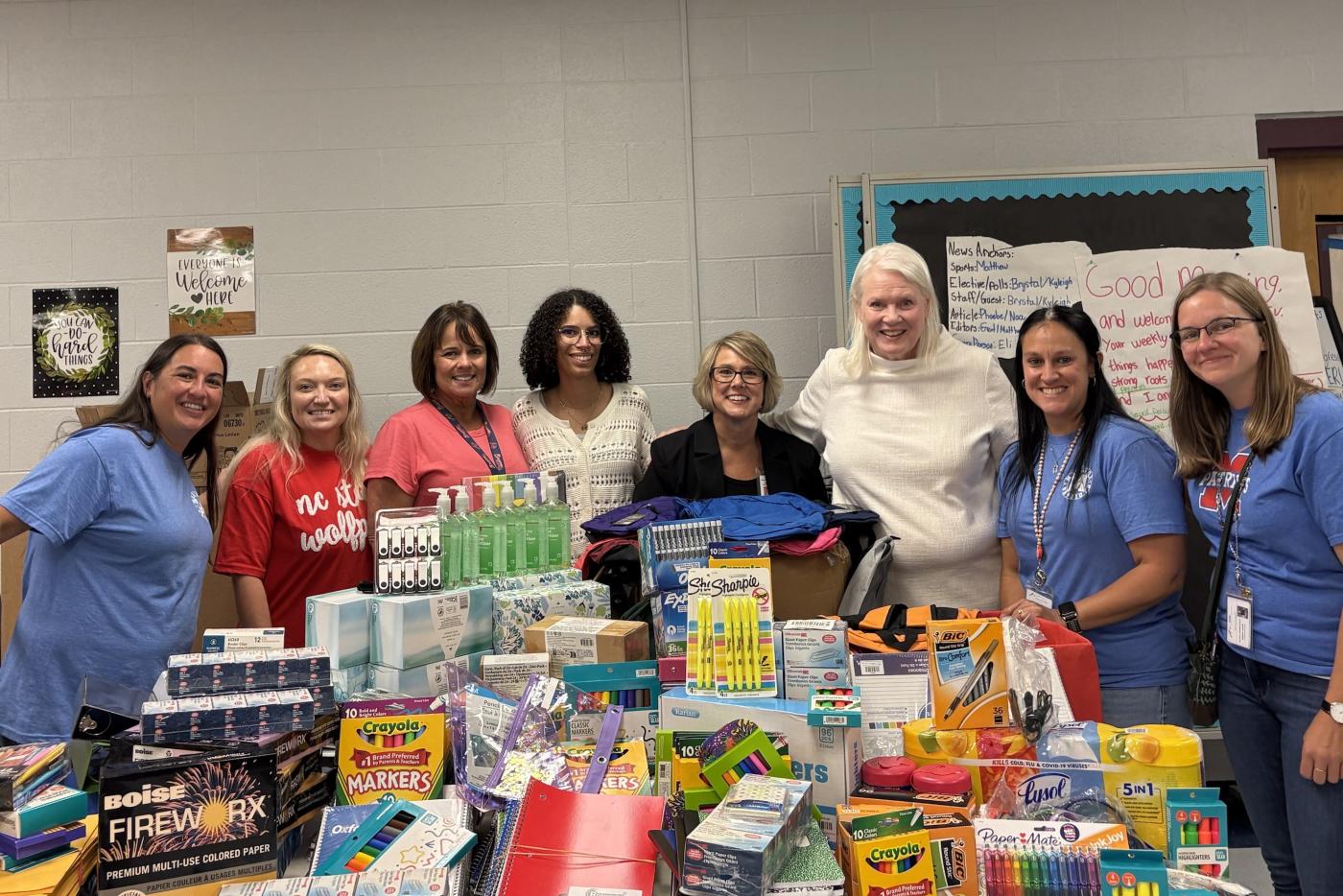 Director Meyer and Madison Middle School Staff with Unpacked Supplies