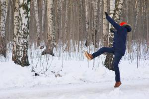 person slipping on snowy path