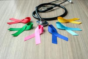cancer ribbons in red, green, pink, blues and yellow cancer ribbons in red, green, pink, blues and yellow