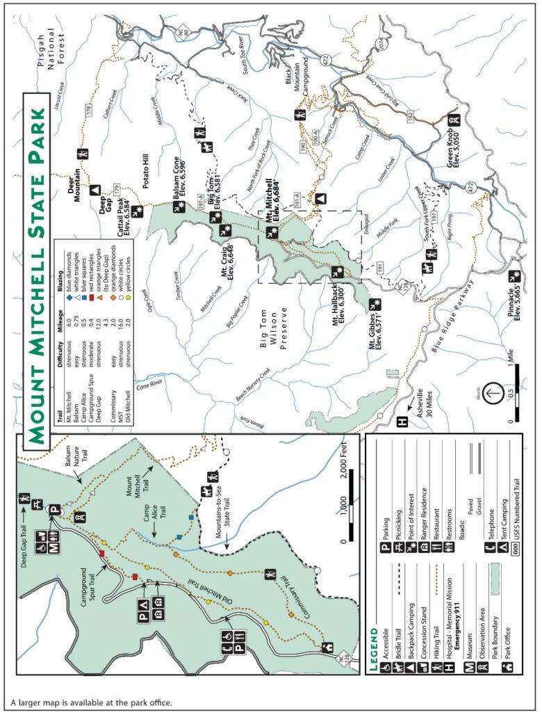 Detailed Park Map of Mount Mitchell State Park showing topography, blazed trails, elevations of peaks such as Mount Mitchell and Mount Craig, parking zones, and facility legends