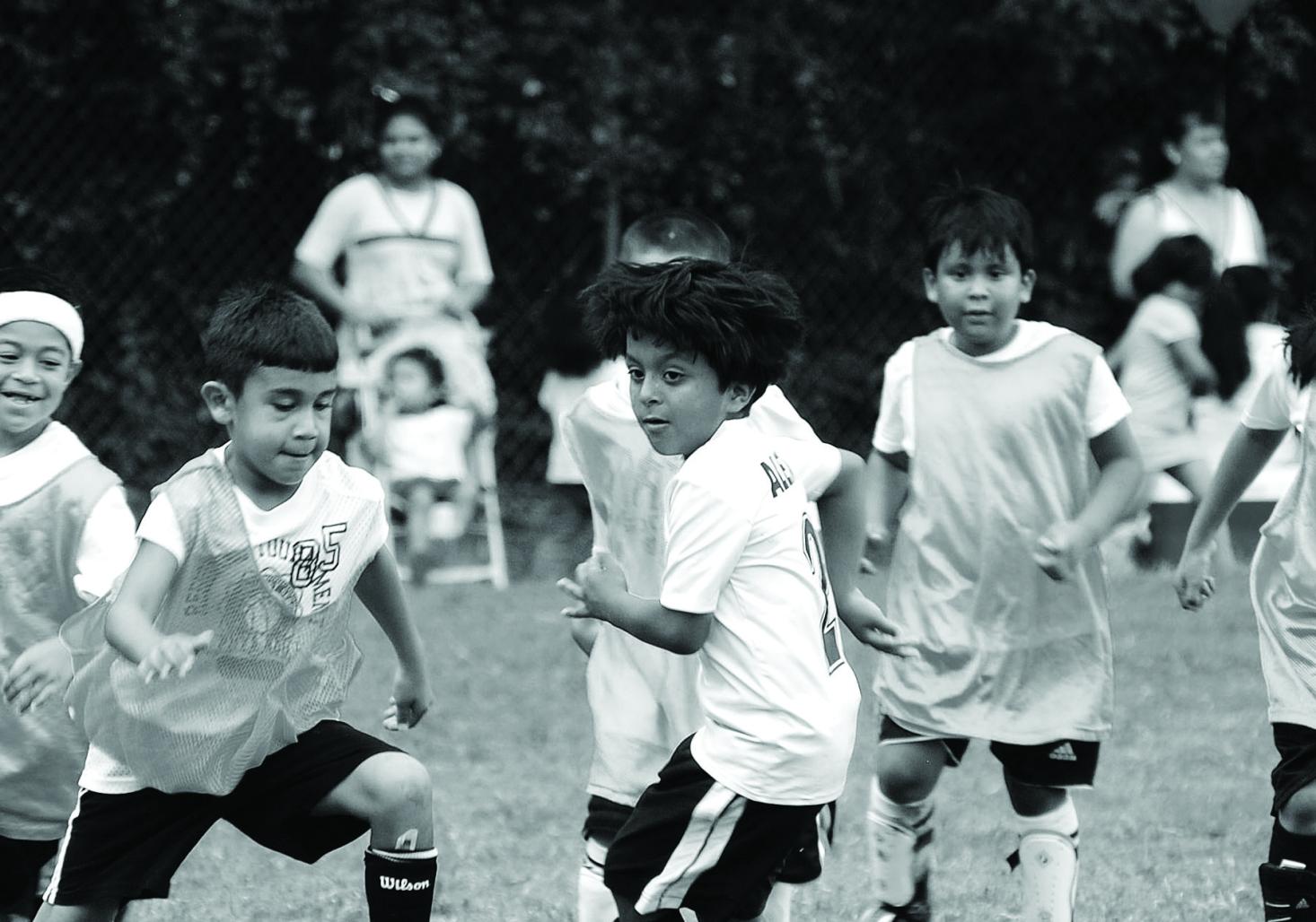Photo of children playing soccer