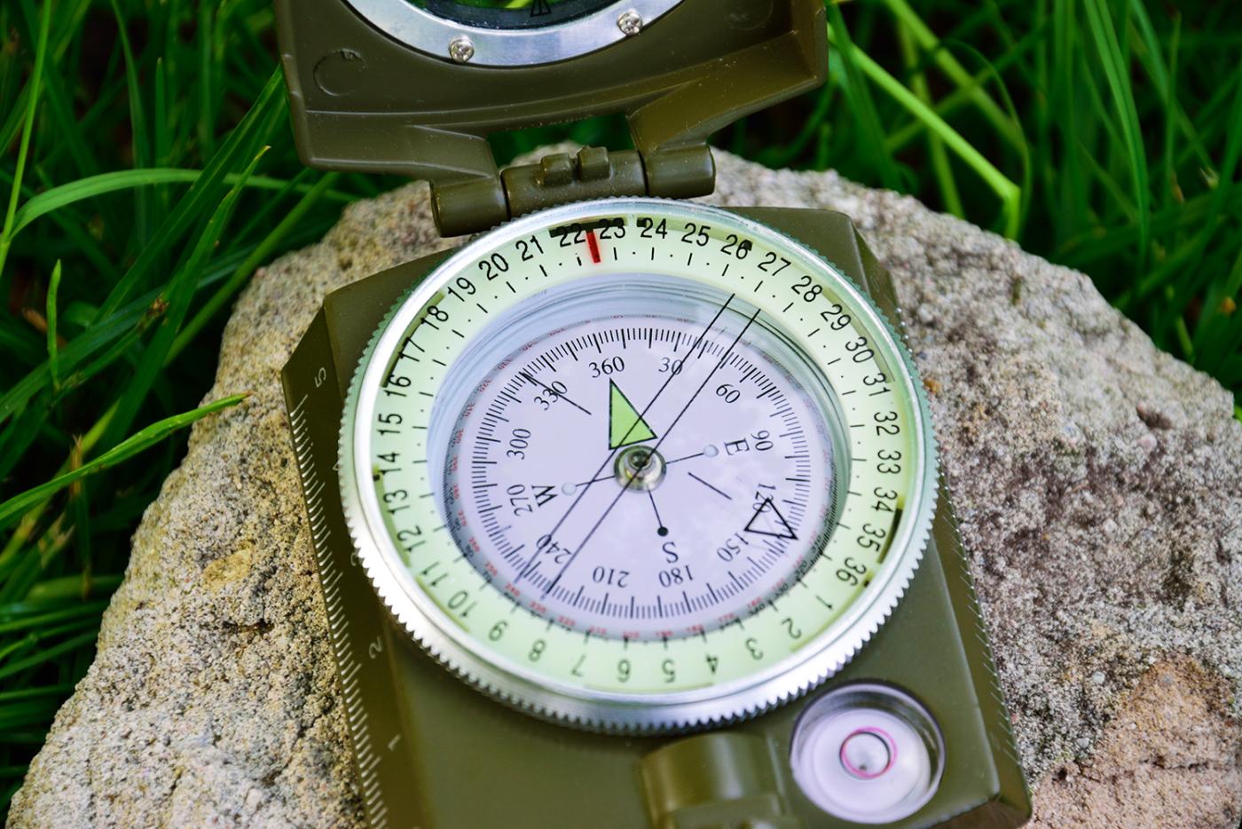 Stock photo: Compass on a rock