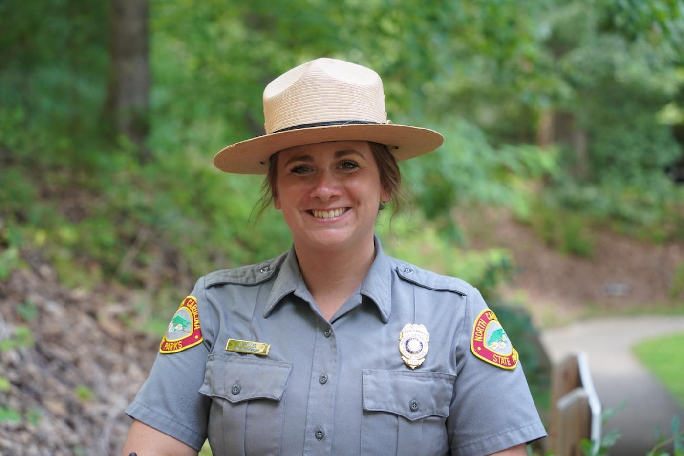 Superintendent Maggie Miller, female in park ranger uniform.