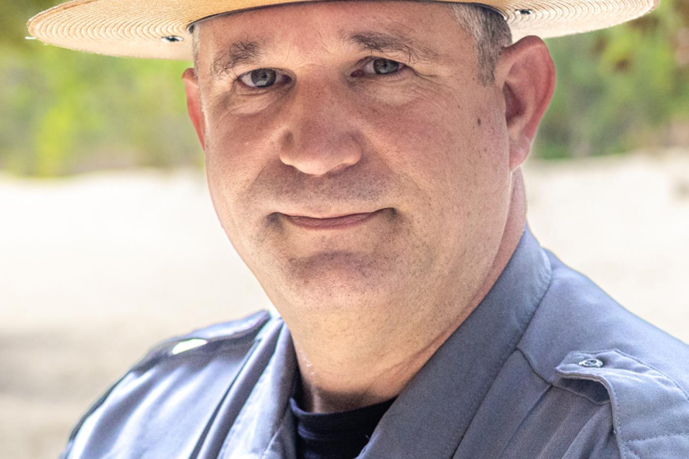 a headshot of a park ranger 