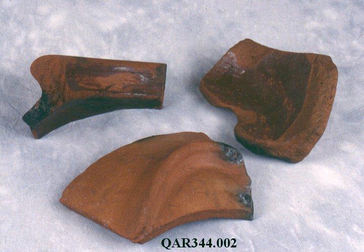 Photo of three sherds, including QAR344.002