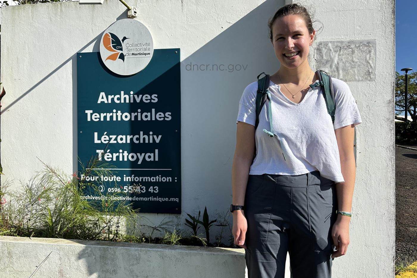 Jill Schuler standing outside the archives