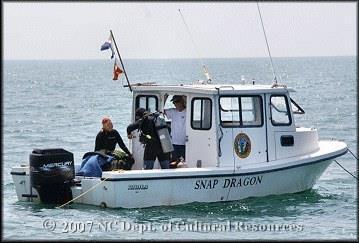 Research vessel SNAP DRAGON on the water with crew