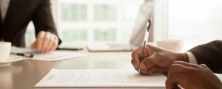 Contracts being signed