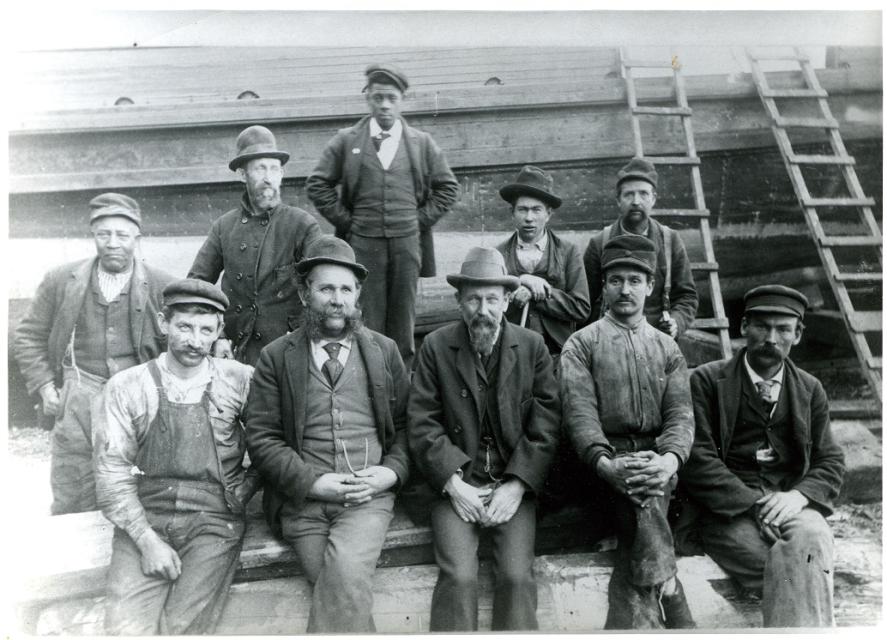 Img: Schooner Under Construction, ca. 1898 Employees of Creef Boatworks in Wanchese standing inside a schooner under construction. Courtesy Outer Banks History Center, Manteo, NC