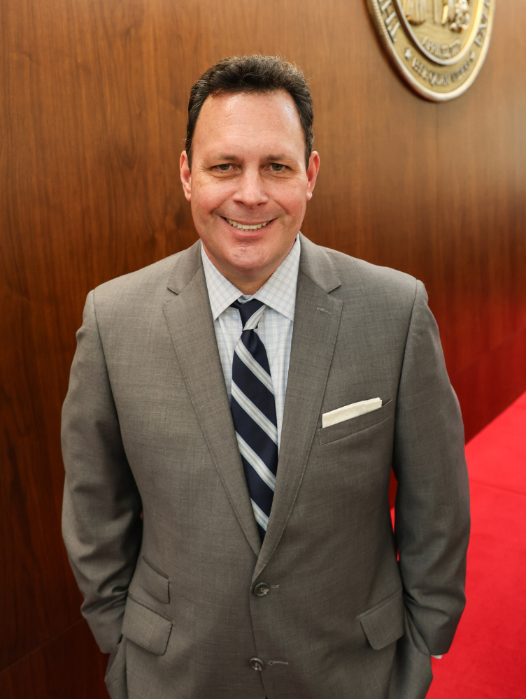 Headshot of Sam Hayes.