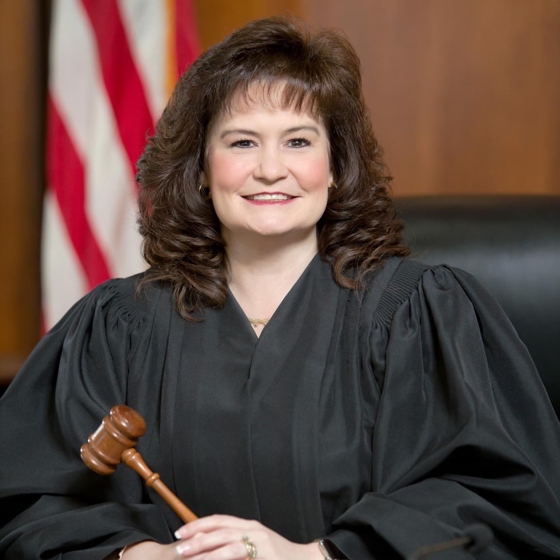 Headshot of April C. Wood.