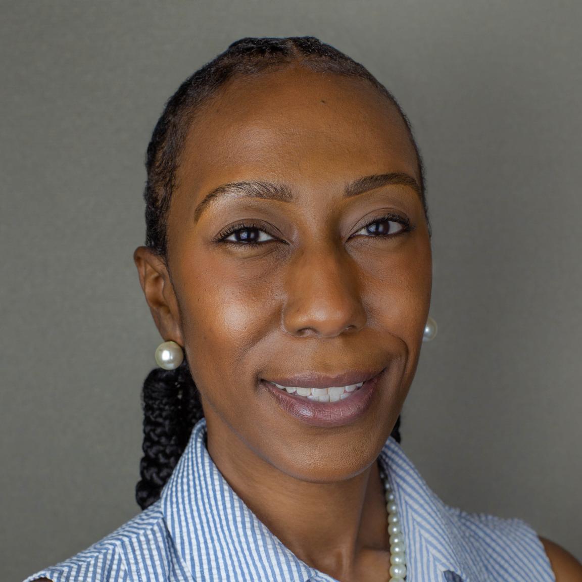 Professional headshot of Courtney Brown