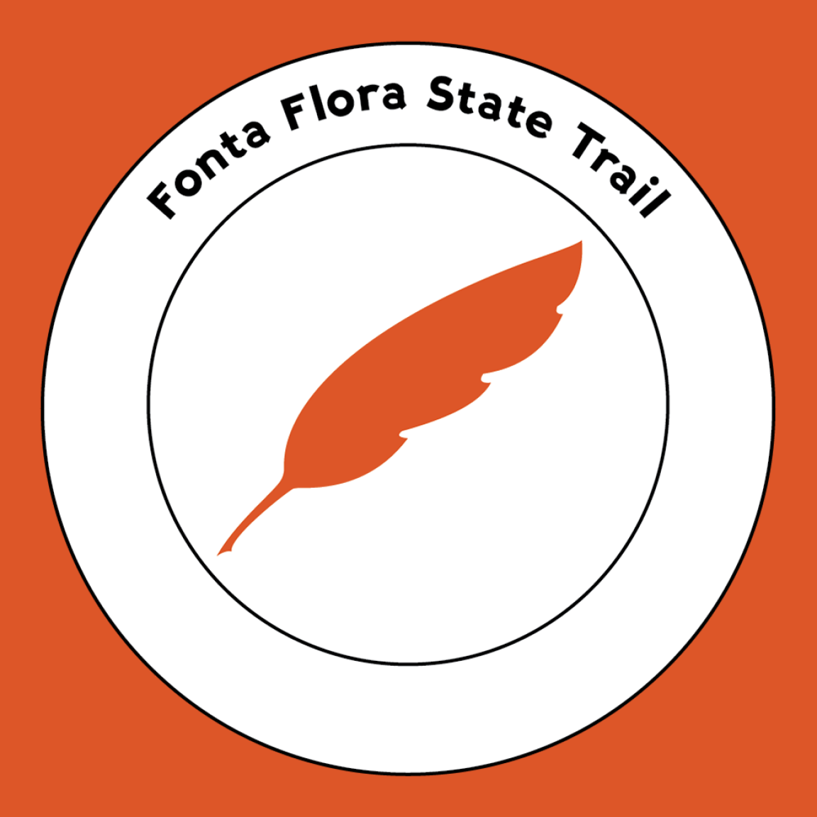 Trail blaze for the Fonta Flora State Trail on a flame color background