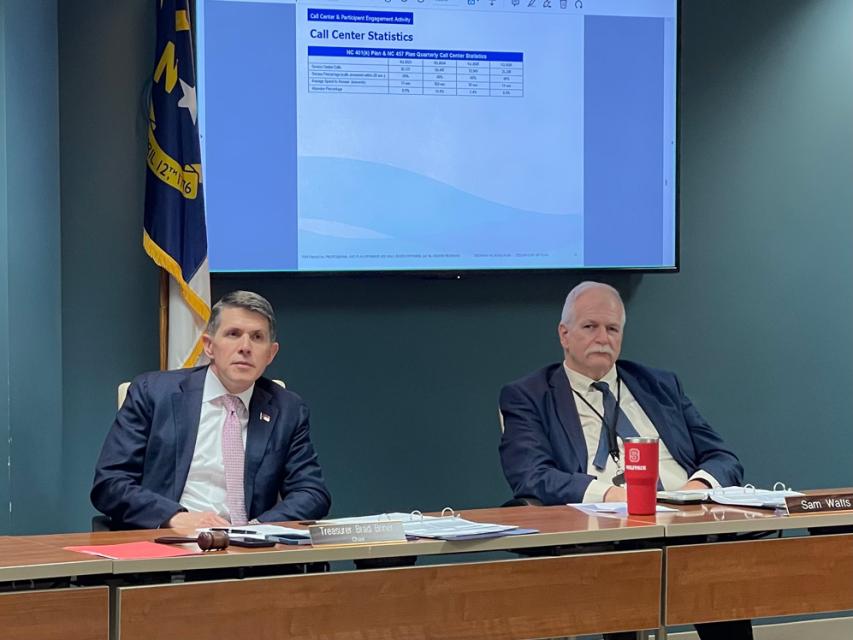 Treasurer Brad Briner and RSD Executive Director Sam Watts listen in for budget presentation. 