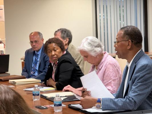 Rowland officials address the LGC.