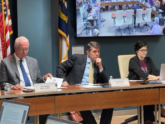 Treasurer Brad Briner chairs the October LGC meeting to consider town finances across N.C.